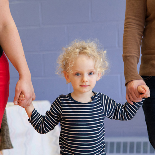 Child holding hands